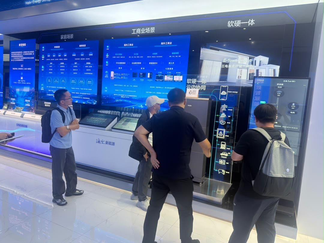 Eng. Mohamed Hamdani and the delegation reviewing advanced smart systems at Haier